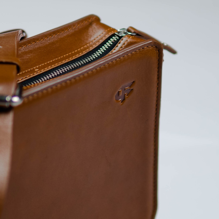 Handmade brown leather sling bag