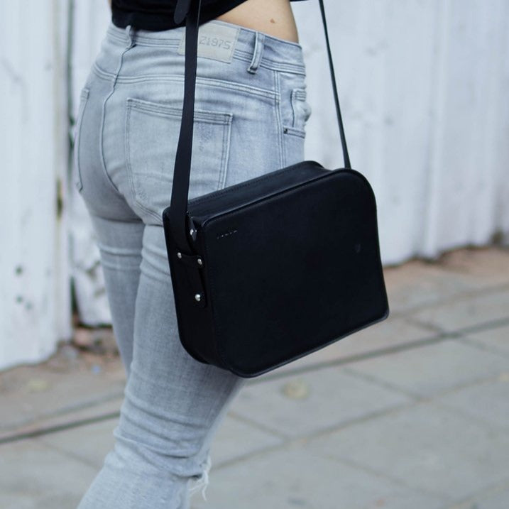 black minimal leather sling bag for girls