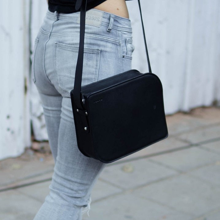 black minimal leather sling bag for girls